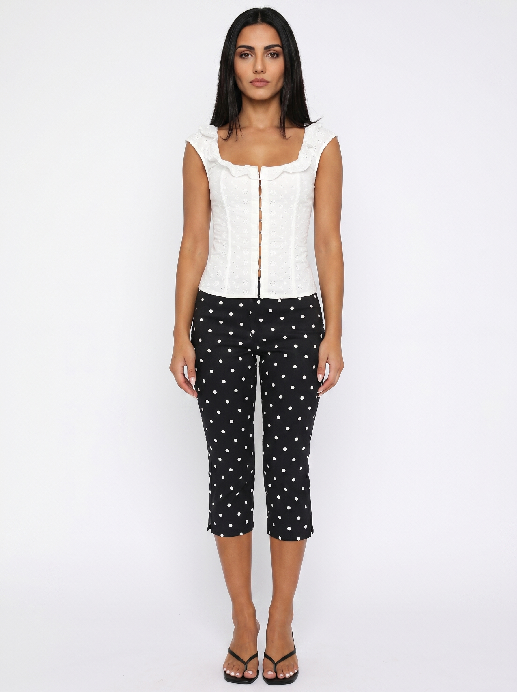 Pantaloni capri